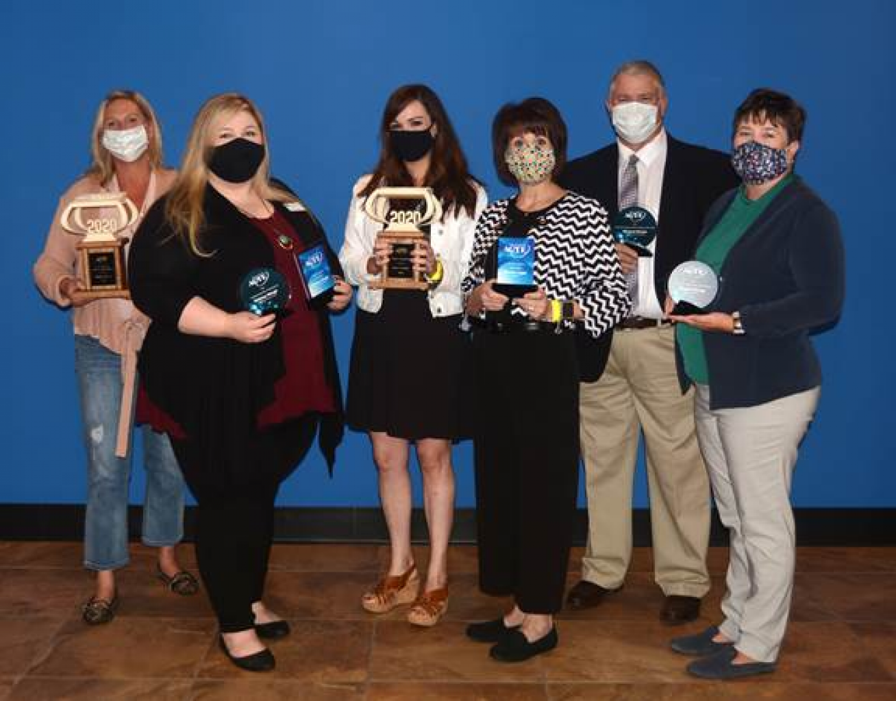Employees receive OkACTE awards and recognition at state conference